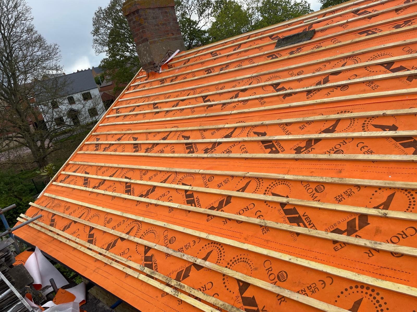 Roofing work in progress by All Pro Contractors